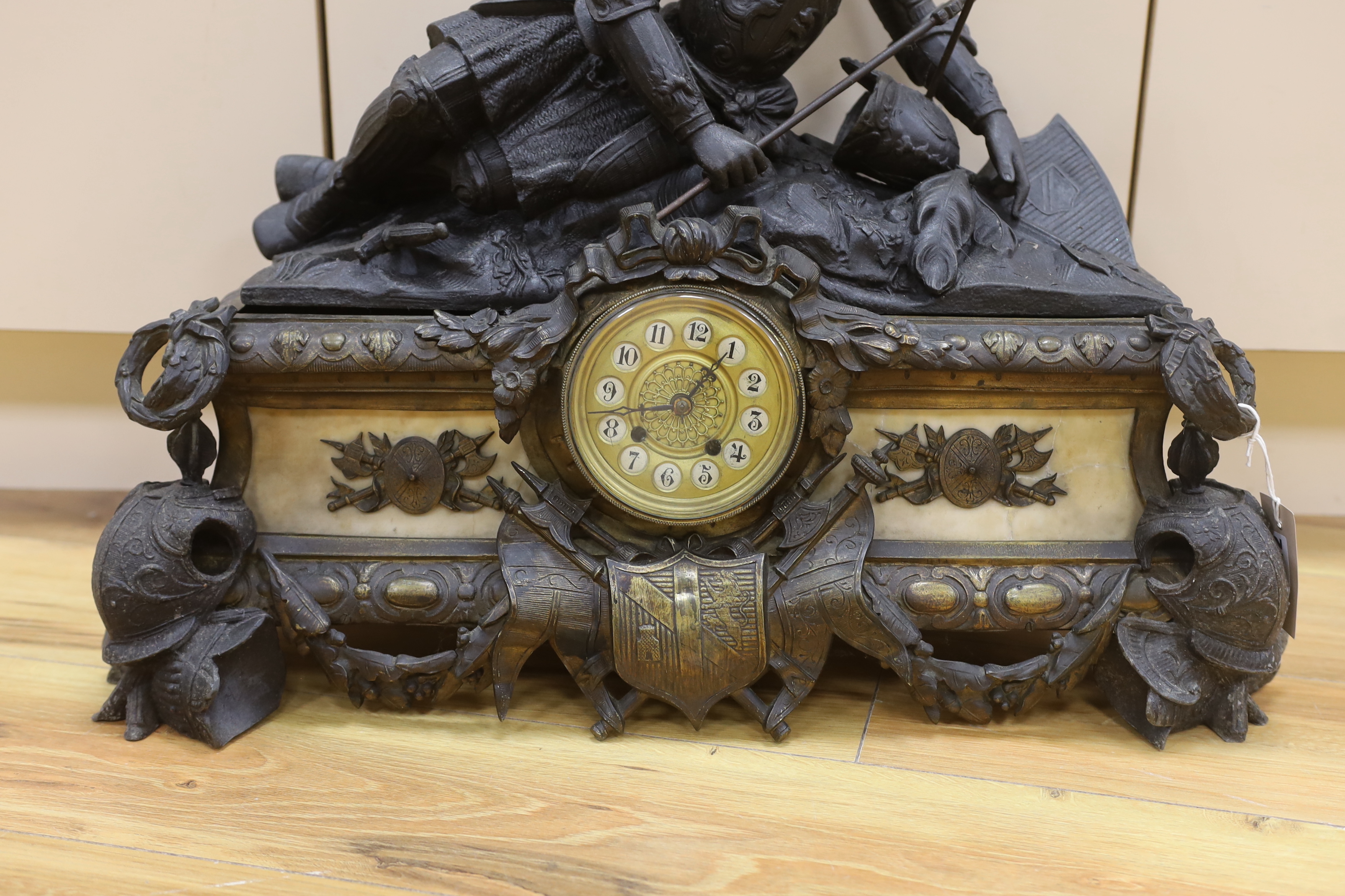 A French spelter and marble figural mantel clock, 52cm tall